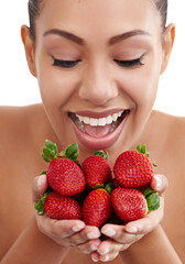 Sticker - Hands, woman and strawberry in studio for diet, bite and nutrition on white background. Fruit, detox or weight loss and benefits for antioxidants, digestion and vitamin or mineral from natural food