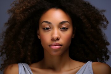 Canvas Print - b'Portrait of a beautiful young African American woman with curly hair'