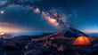A beautiful landscape of a mountain range under a starry night sky. There is a tent on the mountainside.