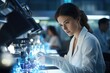 © Thanaphon - A beautiful young scientist in a white lab coat is working in a laboratory.