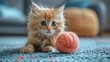 Small Kitten Playing With Yarn Ball