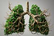A pair of lungs made from green tree branches and leaves.