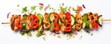 Fototapeta  - Grilled chicken skewers with vegetables on board