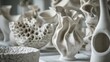A collection of sculptural clay pieces each showcasing a different experimental approach to form texture and structure..