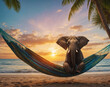 Elephant relaxing on a tropical beach at sunset sky.