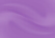 purple satin background with smooth lines in it and copy space