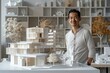 An architect standing beside his modern building model