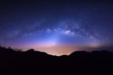 Wall Mural - landscape silhouette tree on high moutain before sunrise with milky way galaxy