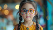 Portrait of a young Asian girl wearing colorful glasses