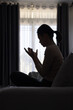 © Tinnakorn - Silhouette of Person women  demonstrating their religious faith. women hand in prayer, expressing his religious faith in God through worship of Jesus Christ.turned to God in prayer.