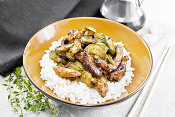 Poster - Stir-fried of chicken with zucchini in plate on granite countertop