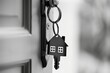 Close-up of shiny house keys symbolizing the concept of acquiring a new home in the real estate market