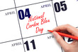 April 4. Hand writing text National Cordon Bleu Day on calendar date. Save the date.