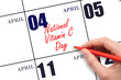April 4. Hand writing text National Vitamin C Day on calendar date. Save the date.