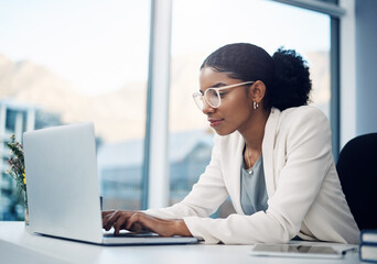 Poster - Businesswoman, typing and laptop in office and working, corporate and online project for website. Internet, search and information on tech, reading email and report with web designer in workplace