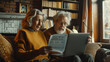 © CozyDigital - Elderly couple is trying to sort out documents using laptop