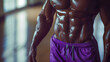 Huge muscular and fit torso of black huge young man having perfect abs, bicep and chest. Fitness concept.