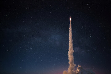 Fototapete - Successful launch of a space rocket into outer space. Spaceship lift off into the starry sky. Travel and exploration other planets, concept.