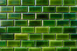 Green glazed tile on the facade of the house in Lisbon, Portugal. Abstract background