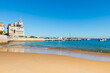 Cascais, Portugal. Beautiful coast of Atlantic ocean with blue water and yellow sand
