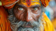 Close-up portrait of an old Muslim man, adorned with traditional face paint, capturing the essence of lifestyle and indigenous cultures. Experience the wisdom and spirituality of age.