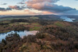 Beautiful, aerial drone landscape image of Lake District during Spring vibrant sunset