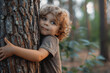 A young boy hugging a tree, saving the environment for the next generation concept
