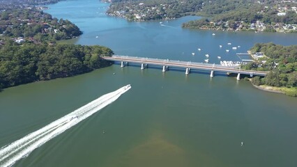 Wall Mural - Aerial drone view of Como Bridge on the Georges River in southern Sydney, Australia on a sunny day in April 2024