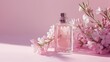 A bottle of perfume and a sprig of tuberose in the sun's rays on a pink background.