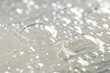 Close-up of white liquid bubbles and molecules, ideal for science and medical-related designs and projects.