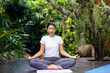 Lifestyle woman yoga exercise and pose for healthy life.  Young girl or people pose balance body vital zen and meditation for workout and fitness sport in nature garden home. Health care Concept