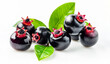 Fresh Guarana with leaves on white background. Exotic fruit concept.