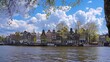 European City. Iconic Amsterdam Landmark - Dancing Houses Along River Amstel