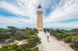 Woman walking towards Cape Du Couedic Lighthouse at Kangaroo Island, South Australia