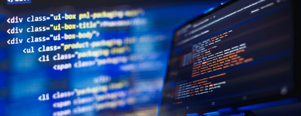 Running Computer data programming. Coding script text on screen. Notebook closeup photo.