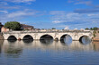 Old stone Tiberius bridge in Rimini Italy summer season