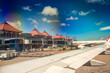 Bali, Indonesia - August 30, 2023: Airplanes along the Ngurah Rai International Airport runway in Denpasar
