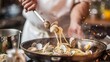 A chef preparing a gourmet linguine alle vongole dish, tossing freshly cooked clams in a flavorful garlic and white wine sauce.