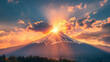 The captivating sight of a vivid sunset breaking through the clouds over the iconic snow-capped Mount Fuji in Japan