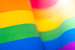 LGBT Pride Month rainbow texture concept. LGBTQIA Pride colorful blurred background. Freedom rainbow flag, selective focus.