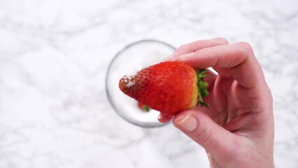 Wall Mural - Washed and Dried Strawberries Stored Safely in a Glass Bowl