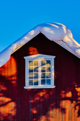 Wall Mural - Winter time in the cultural landscape of Toten, Norway, in January. Image shot in the area between Kolbu Church and Gardlausstua.