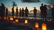 © cvetikmart - Candlelight vigil held at beach dusk, honoring those lost in the slave trade. International Day for the Remembrance of the Slave Trade and Its Abolition, August 23