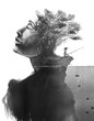 A surreal double exposure portrait of a woman's profile painting