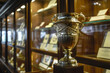 Elegant trophy on display in historical club awards cabinet