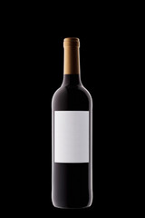 Wall Mural - Bottle of wine with a white label with beautiful highlights on a black background