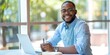 © LukaszDesign - Businessman writing and preparing on computer for financial career notes, facts, and workplace reminders. Professional African accountant on laptop and notebook for cheerful ideas and brainstorming