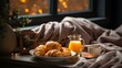A Cozy Breakfast Nook with Croissants and Orange Juice