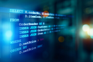 Wall Mural - developer or programmer's text editor showing sql structured query language code on computer monitor