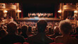 © Frank Gärtner - Over-the-shoulder view of a theater audience watching a stage performance, capturing the atmosphere